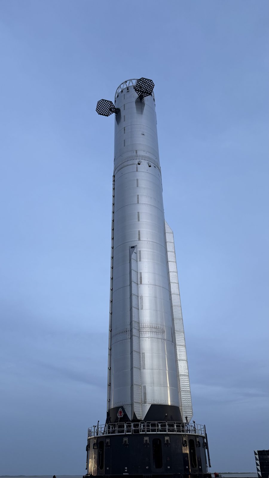 A Super Heavy booster at dusk